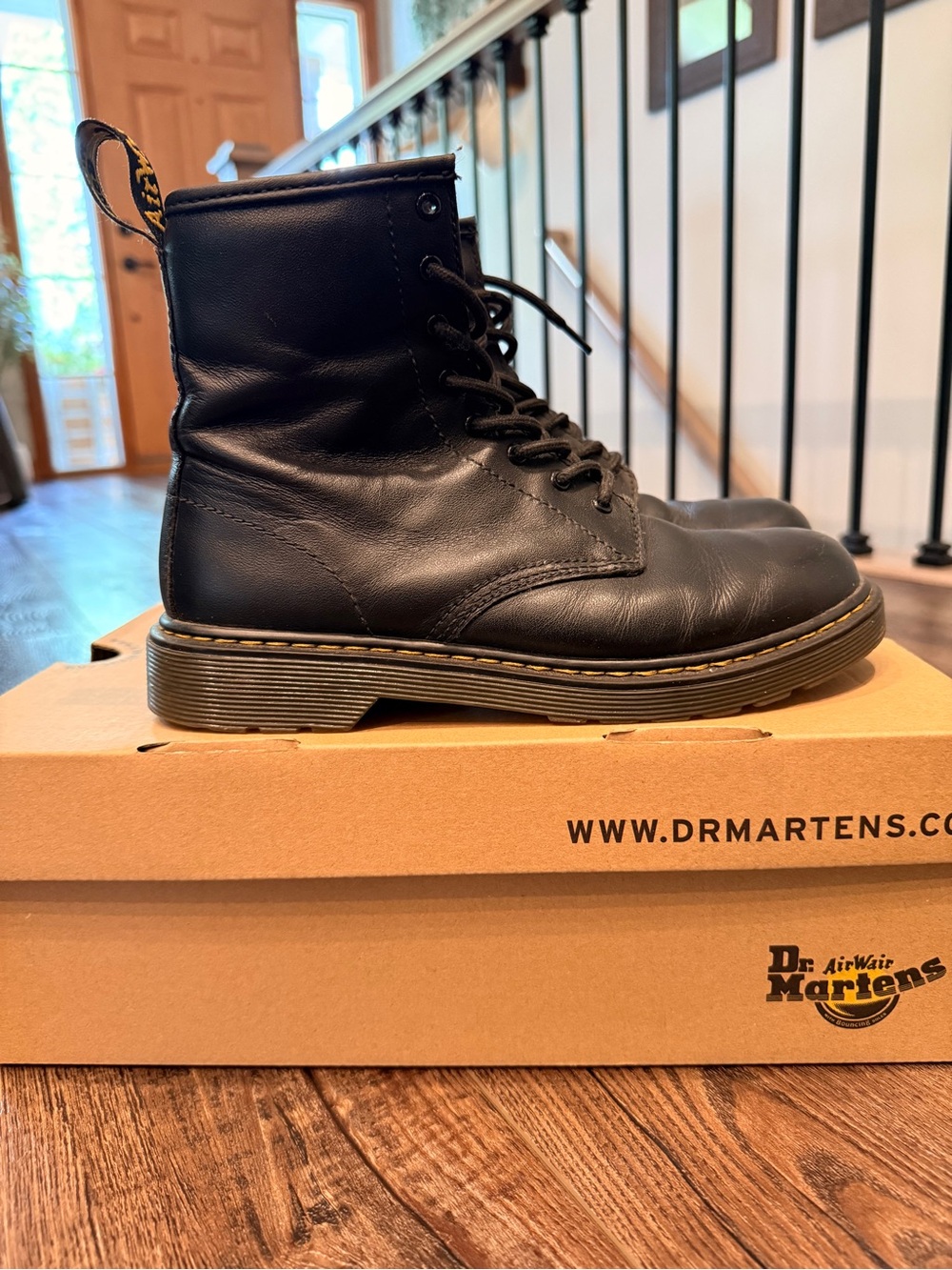 Dr. Martens Black 8-Eye Leather Combat Boots with Yellow Welt Stitching
